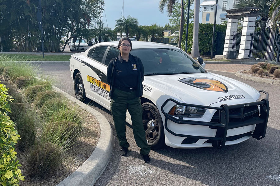 female security guard with car at the back coconut creek fl